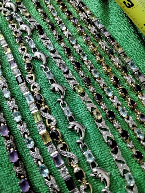 11 Silver Bracelets 