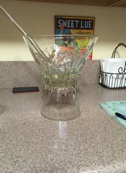 Old princess house ice bucket and large fruit bowl I turn the ice bucket upside down and put the bowl on top and make a punch bowl with the glass lid