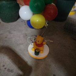 Winnie the poo night light, plays the song...