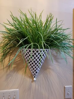 Wrought iron and greenery decor