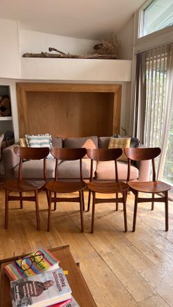 Four West Elm dining chairs