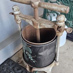 antique cast iron fruit and lard press
