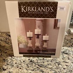 Kirkland set of 3 candles holders. brand new