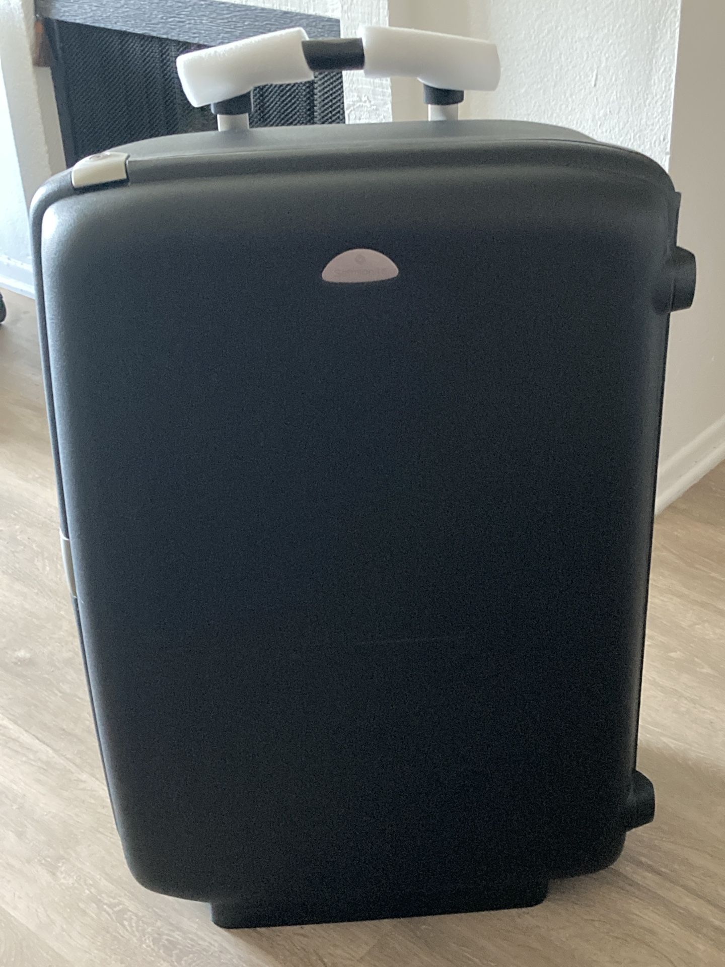 Samsonite 30” Black Hard Shell Rolling Luggage