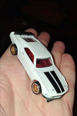 Diecast Car 1969 Mustang BOSS White with Black Racing Stripes  Gold Wheels Fat Tires