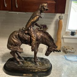 Frederic Remington's "The Norther" (measuring 22"H x 18"L x 9"W) 