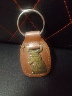 1980s leather fob key chain with a brass toned metal fox with glasses.