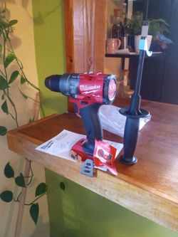 Milwaukee 18v fuel.  Hammer drill.   2 speed.   1/2".    W/ handle