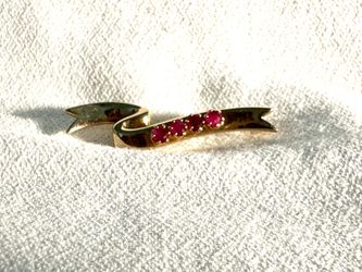 Vintage signed Avon 4 red rhinestones gold tone metal ribbon pin  1983 signed Avon 4 red rhinestones gold tone metal 1983