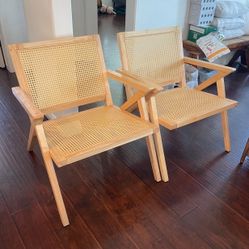 Rattan armchair by Tommy filger. 2 in perfect condition. Hardly used. Only used for  decoration. 