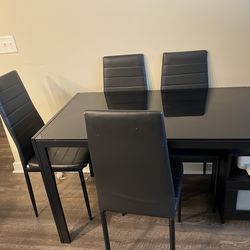 Dining table with 4 leather chairs