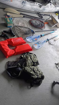 Predator kayak 13 ft long.  wide body , comes with all accessories been on the water about ten times