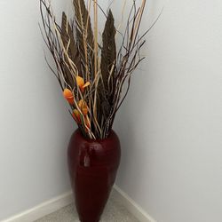 Tall flower vase with flowers 