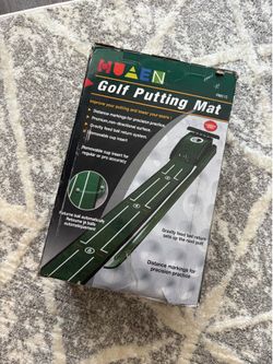 Golf putting mat