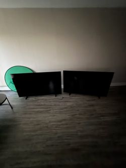 Two 65 inch Samsung smart TV’s