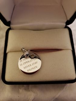 Silver charm or pendant