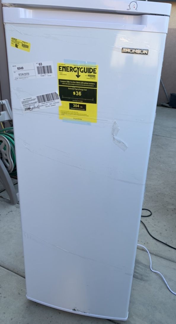 New Upright Freezer With Dent On Side Top Left Side
