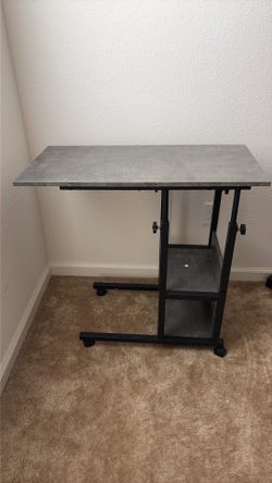 Adjustable mobile desk