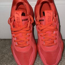 Red Puma Sneakers Size 9.5M Women 