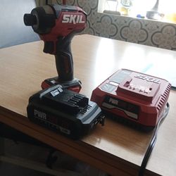 Skil Power Impact Gun , Charger And Battery 