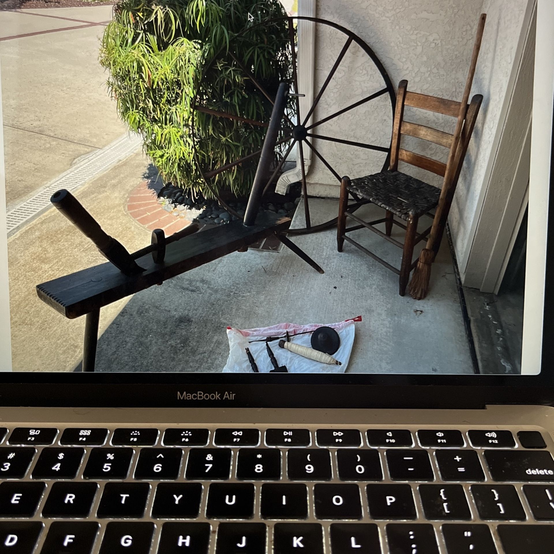 Antique Spinning Wheel, Chair And Broom