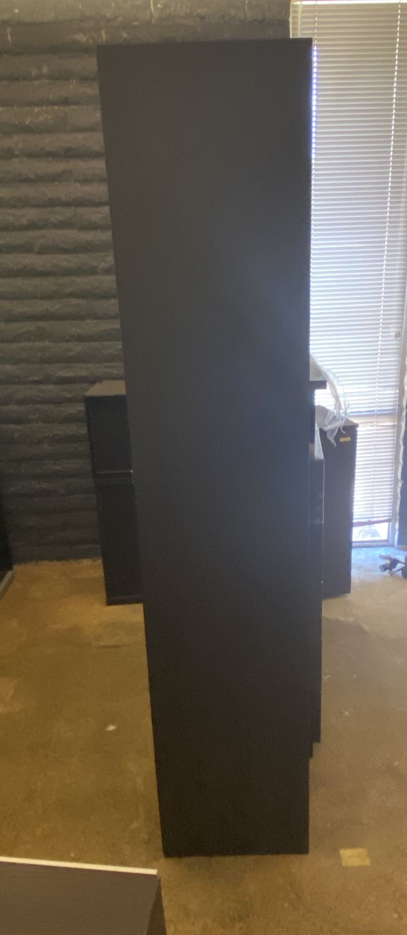 Tall storage cabinet