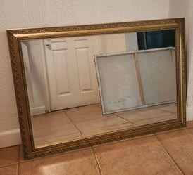 Beveled Glass Mirror with Ornate Gold Frame