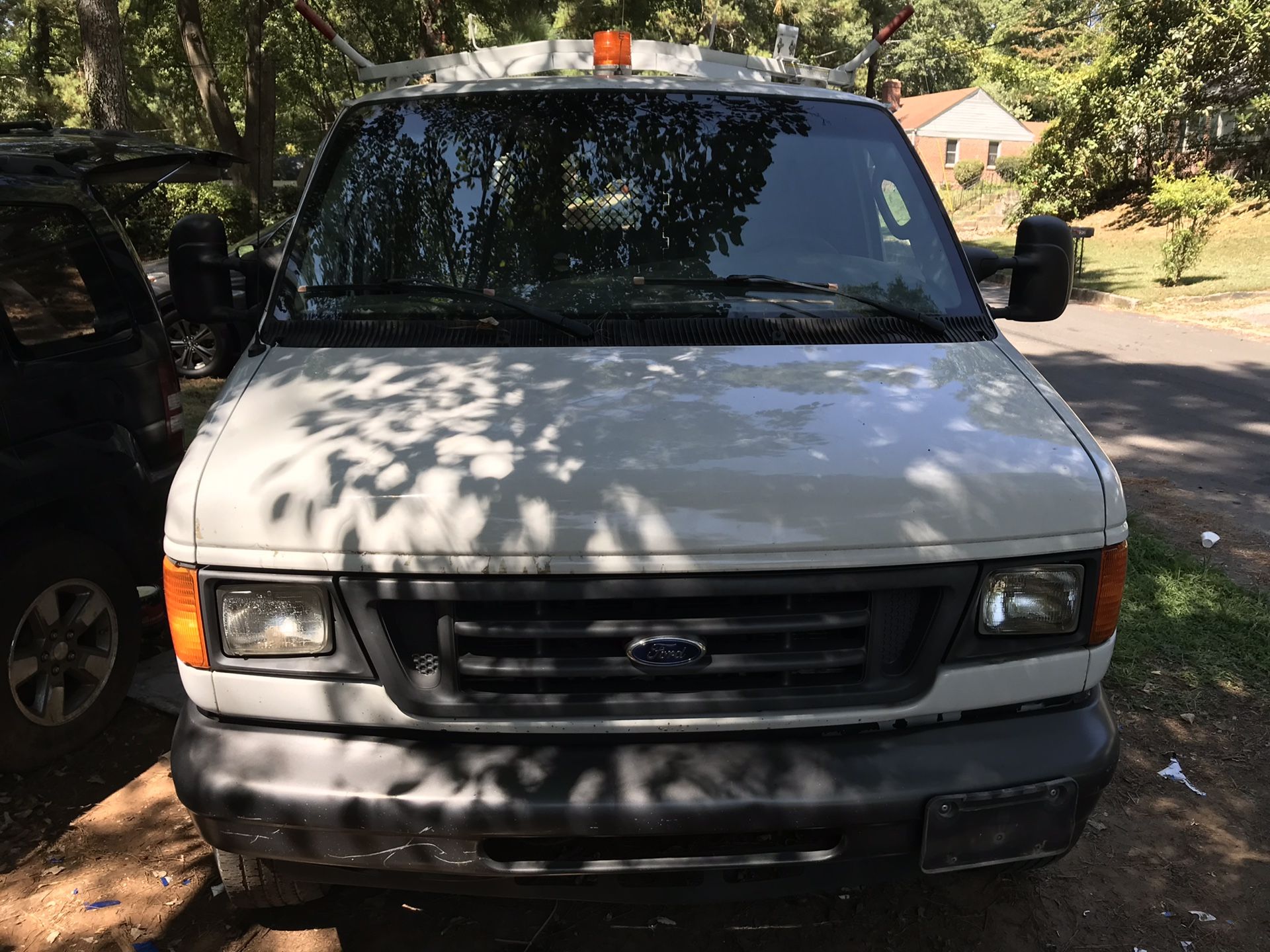 2007 Ford E350 cargo w/ ladder rack $ shelves