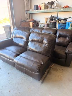 Brown reclining sectional couch
