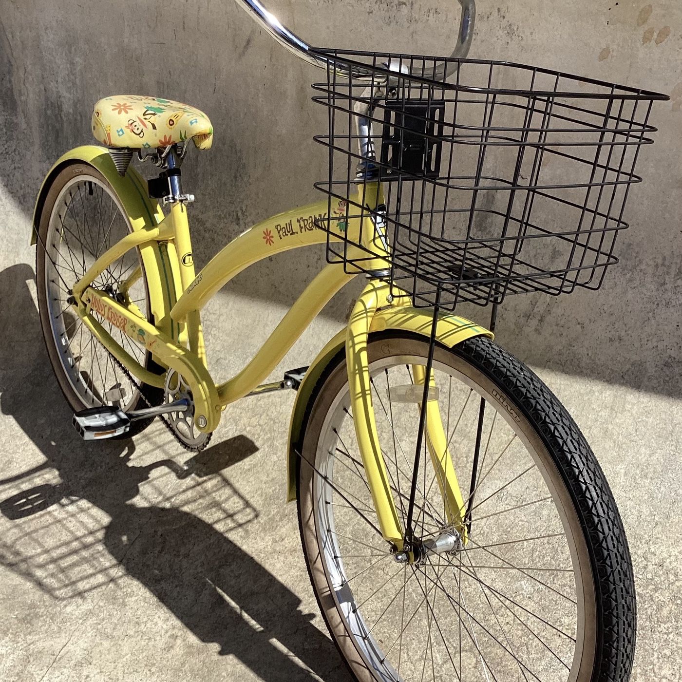 Yellow beach cruiser bike with basket sale