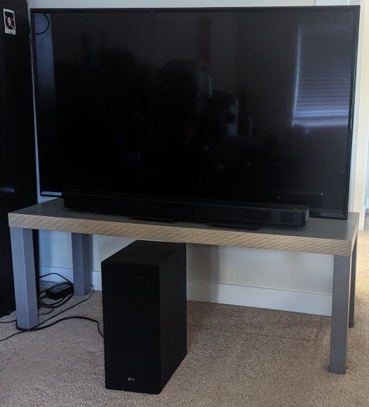 LG 55 Inch TV With SLY5 Soundbar and subwoofer