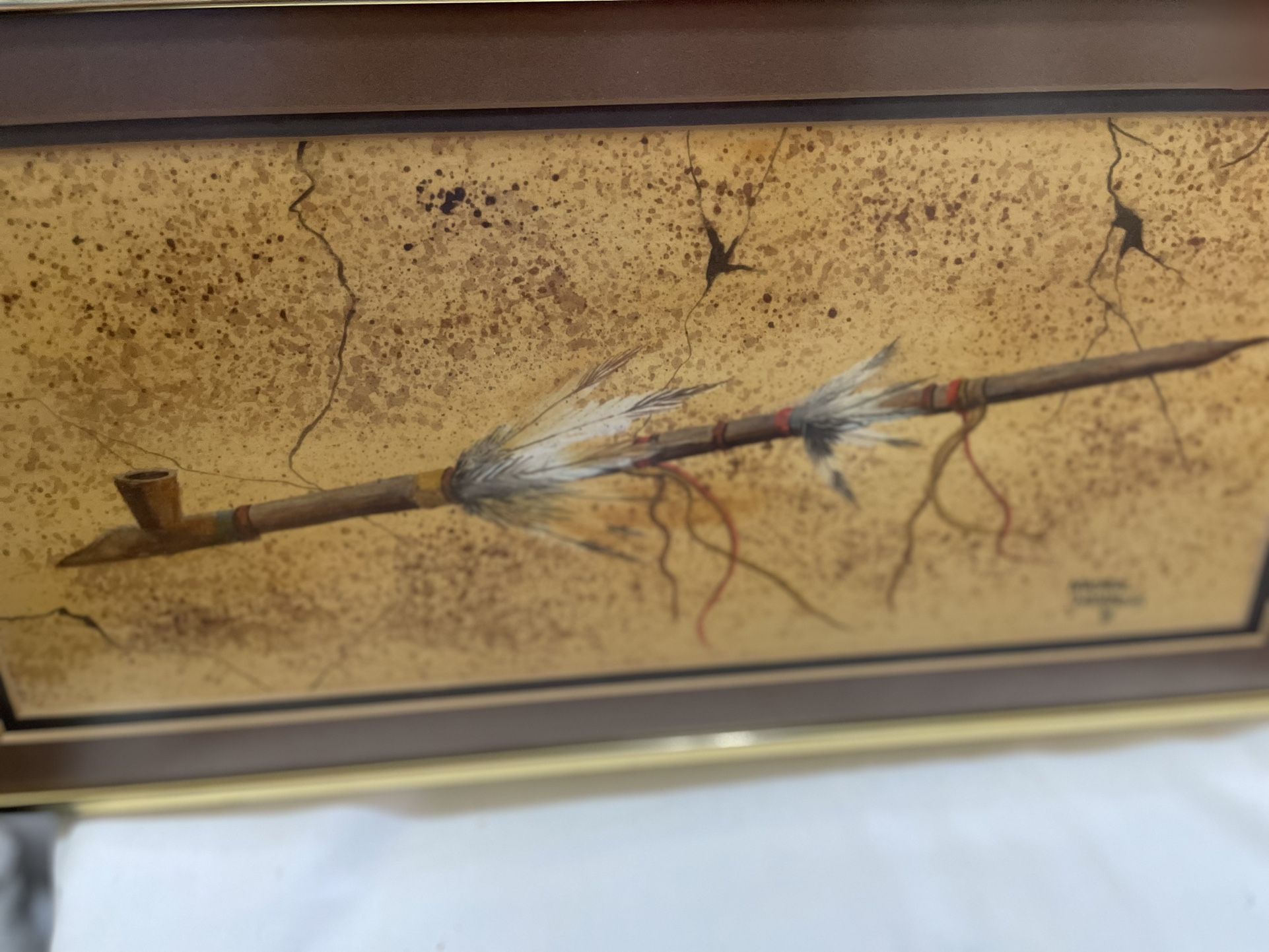 Michael Hammons watercolor of authenic peace pipe matted in gold color metal frame 8”x16”