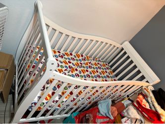 White crib with mattress