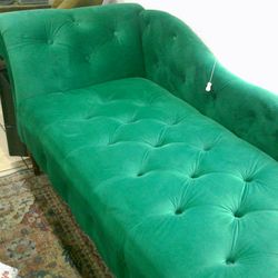 Green tufted chaise lounge chair
