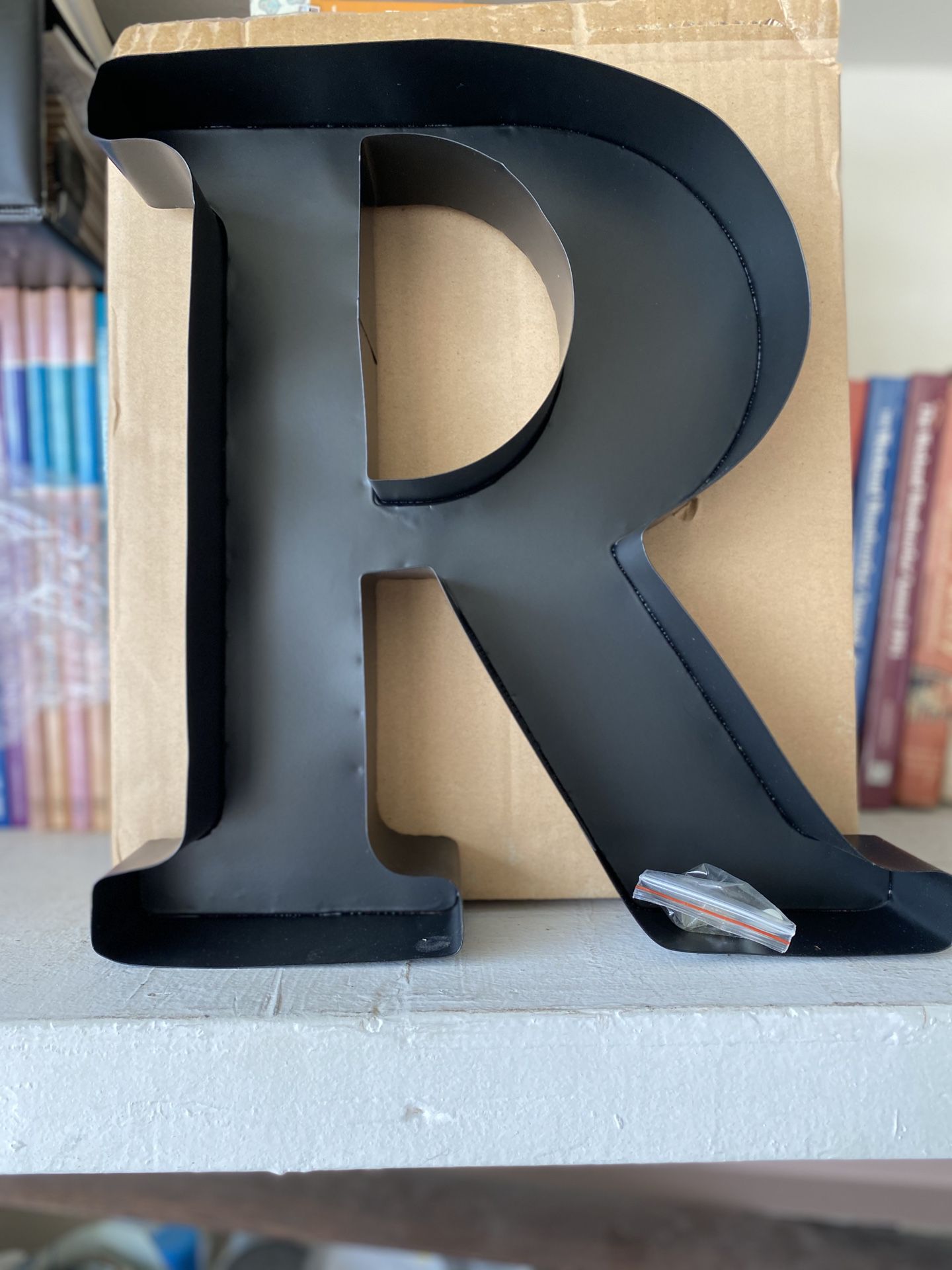Metal letter R