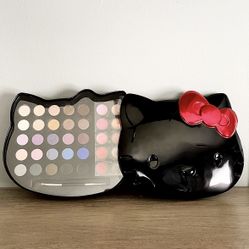 Hello Kitty by Sanrio Noir Eyeshadow and Lip Gloss makeup Palette. ‎Pounds. Basically a new pallet just tested a couple of colors. Like new! 