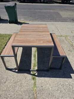 Table with 2 benches. Can be used indoor our outdoor.