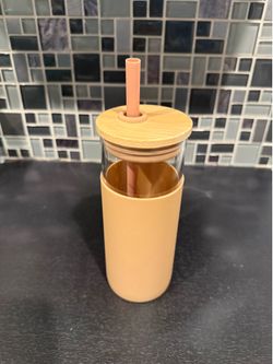 Glass water cup with bamboo lid, silicone grip and straw