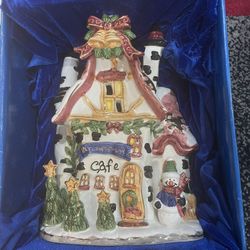 Set Of 6 Ceramic Candle Lit Village Pieces