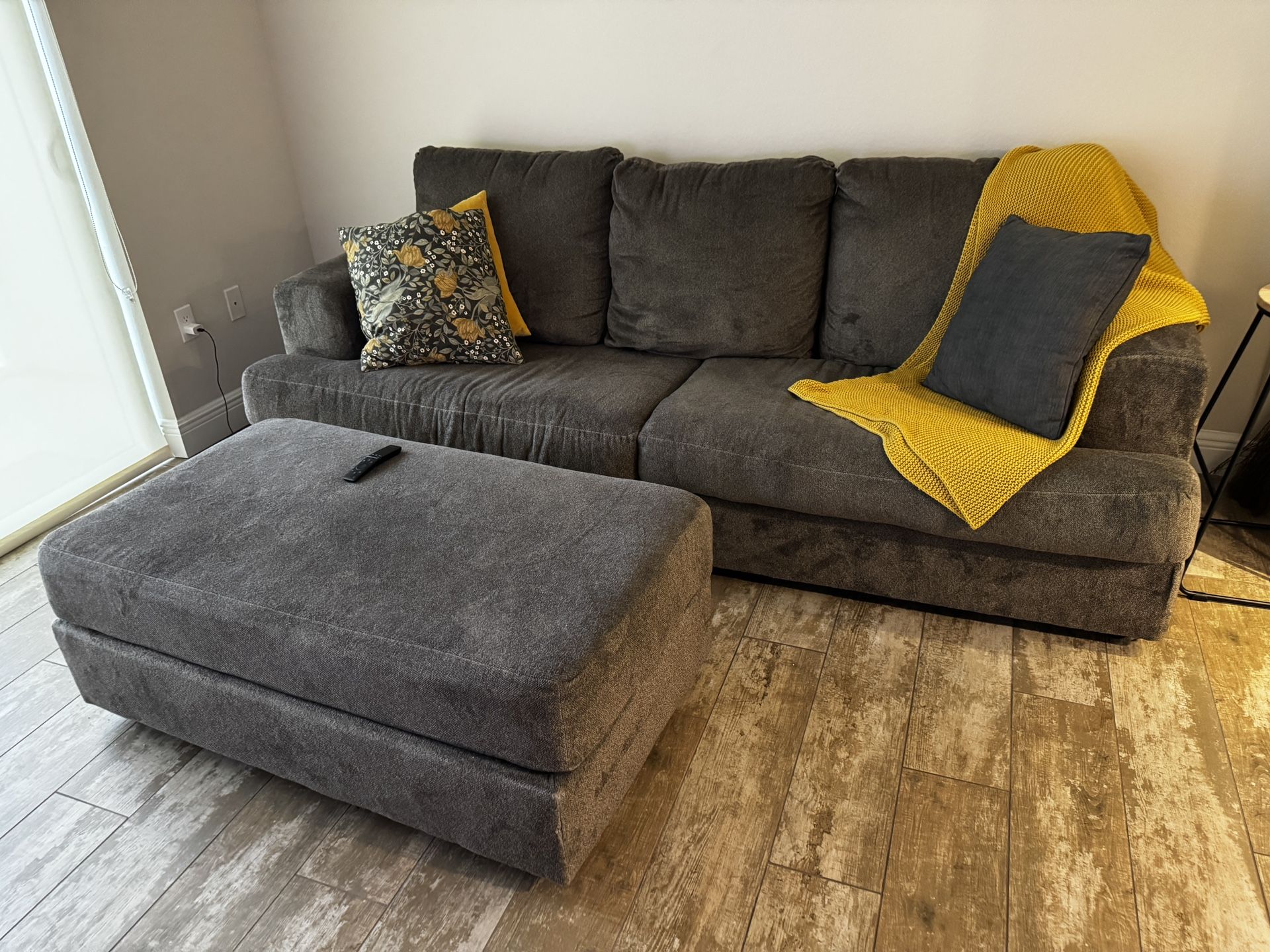 Gray Sofa And Ottoman