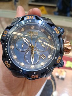 Blue Invicta wrist watch