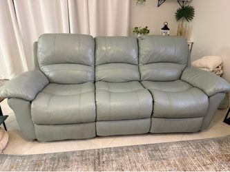 2 sea foam color couches