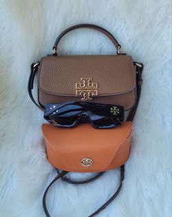 TORY BURCH Originales $170, por las dos.