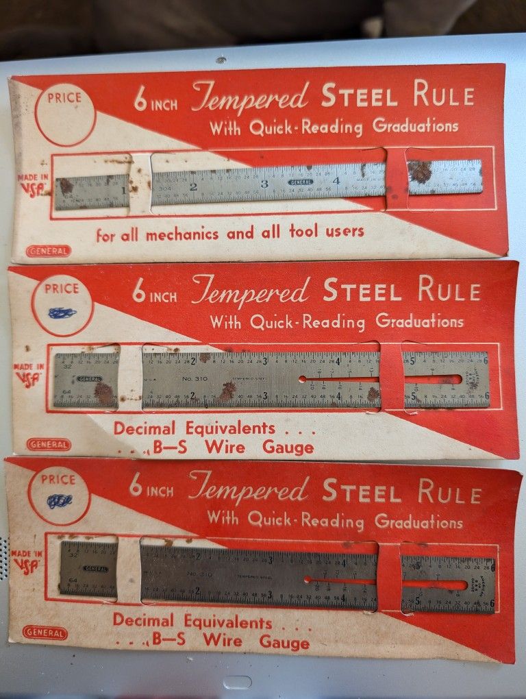 General 6" Tempered Steel Rule No. 304 With Quick Reading Graduations. Bottom 2 No. 310 Have Decimal Equivalents B&S Wire Gauge. Made In USA. Surface