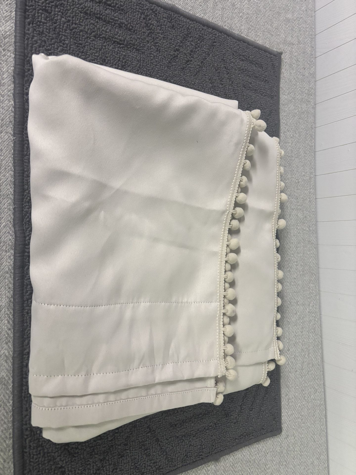 Pom Pom Trimmed Quilt