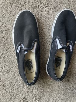 Women’s size 7 Black Vans slip ons