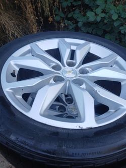 A Nice Pair Of Chevrolet Rims& Tires