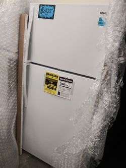 NEW whirlpool 28 in top and bottom fridge