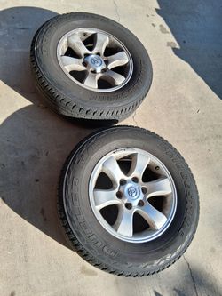 Only 2 toyota truck wheels $50