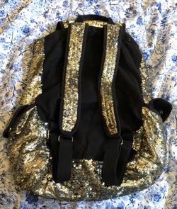 LARGE gold sequence victoria secret backpack (open to trade)